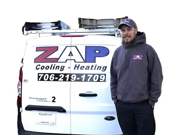 HVAC Installer Dillon Callahan standing by ZAP Work Van with transparent background | ZAP Cooling & Heating