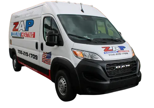 White service van with ZAP plumbing, heating, and cooling logo, contact number, and American flag decal.
