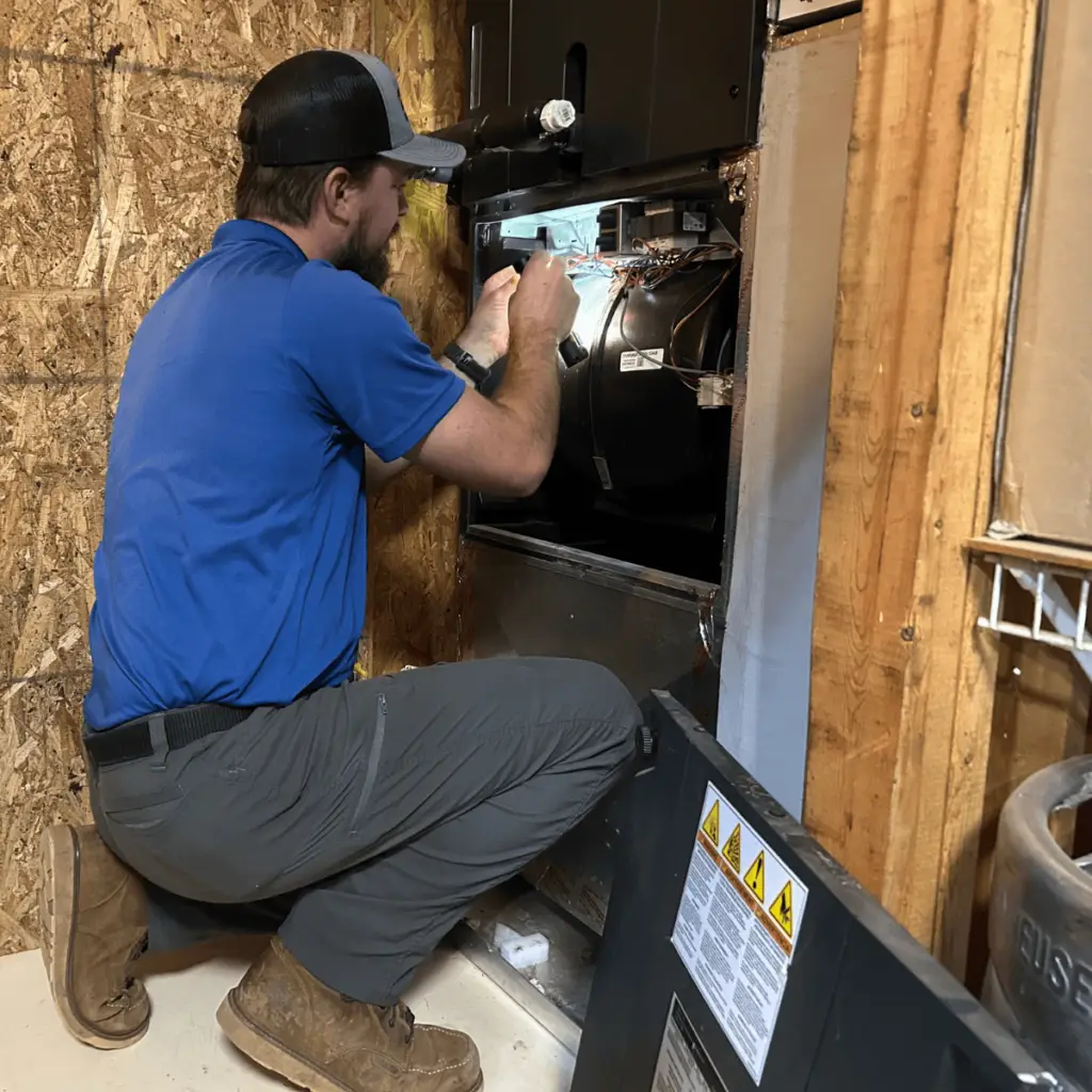 Tech Installing New Furnace