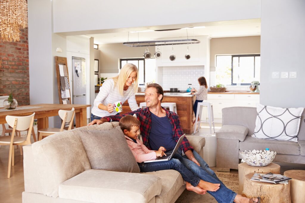Family relaxing in a comfortable cool room.